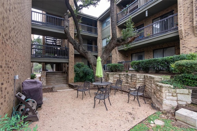 view of patio with a grill