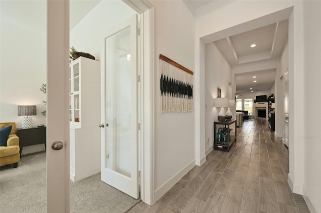 corridor with a tray ceiling