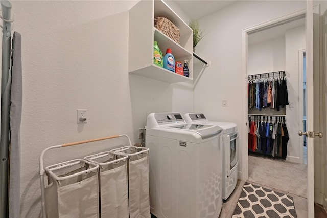 laundry area featuring independent washer and dryer