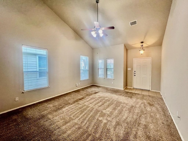 interior space featuring high vaulted ceiling and ceiling fan