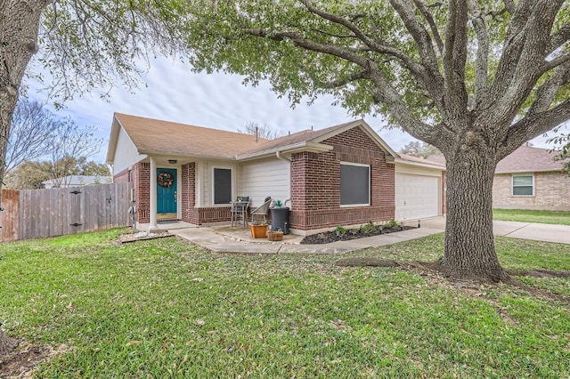 single story home featuring a garage and a front yard