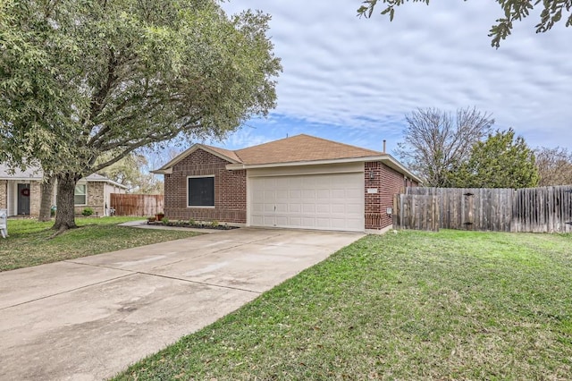 ranch-style home with a front lawn and a garage