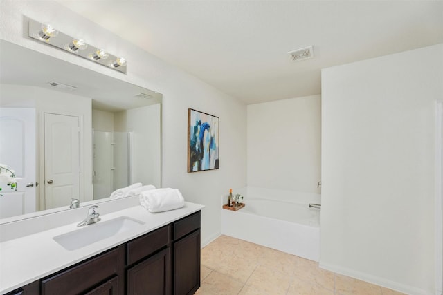 bathroom featuring tile patterned flooring, vanity, and independent shower and bath