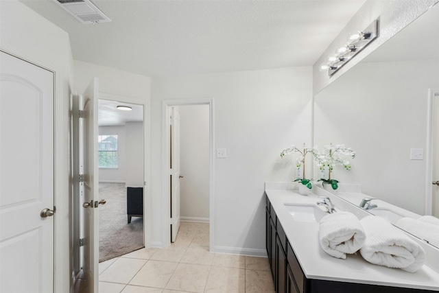 bathroom featuring vanity and tile patterned floors