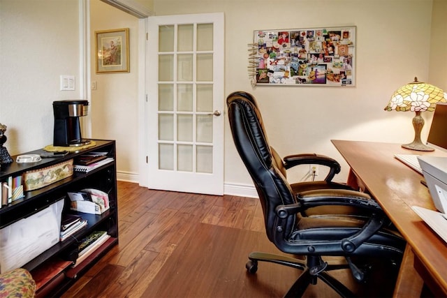 office with french doors and dark hardwood / wood-style floors