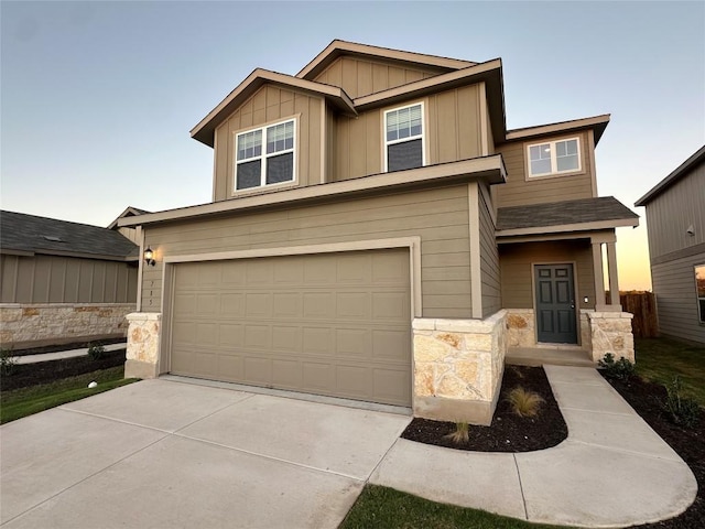 craftsman house with a garage