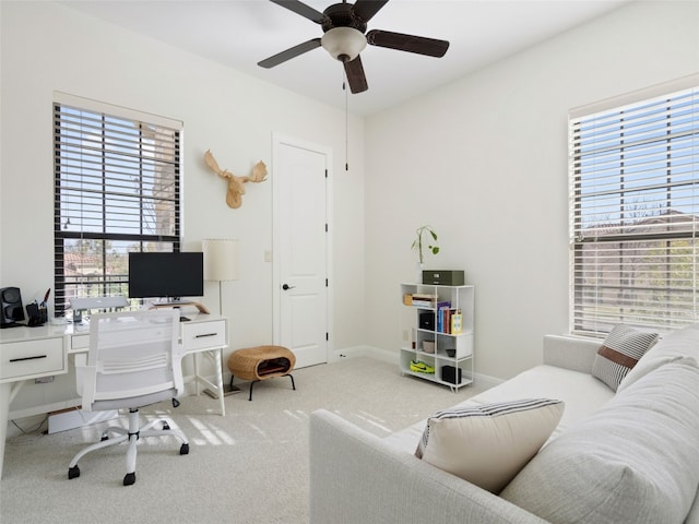 home office featuring ceiling fan and carpet floors