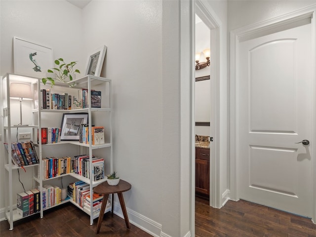 hall featuring dark wood-type flooring