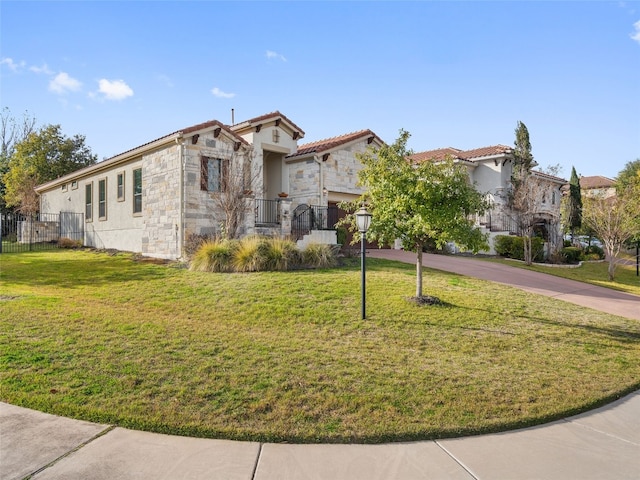 view of front of house with a front lawn