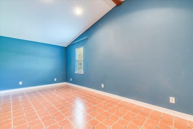 unfurnished room featuring high vaulted ceiling