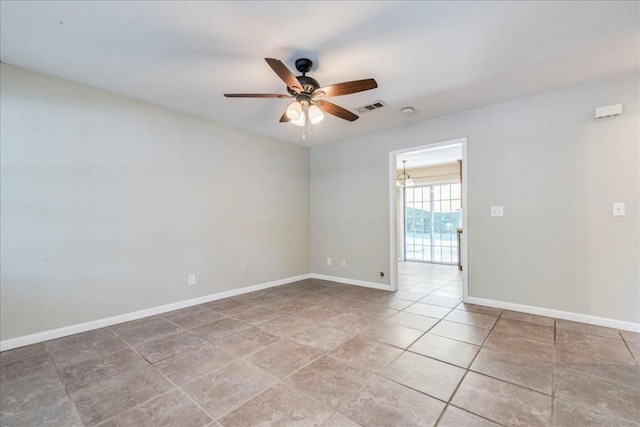 609 Cottonwood St, Lockhart, TX 78644 - empty room with baseboards, a ceiling fan, and visible vents