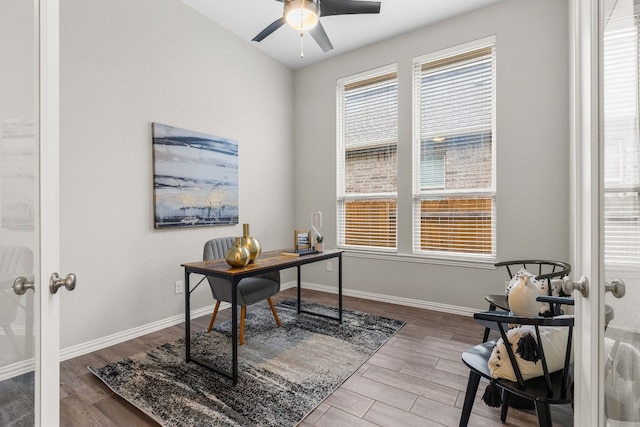 office space with hardwood / wood-style floors, ceiling fan, and french doors