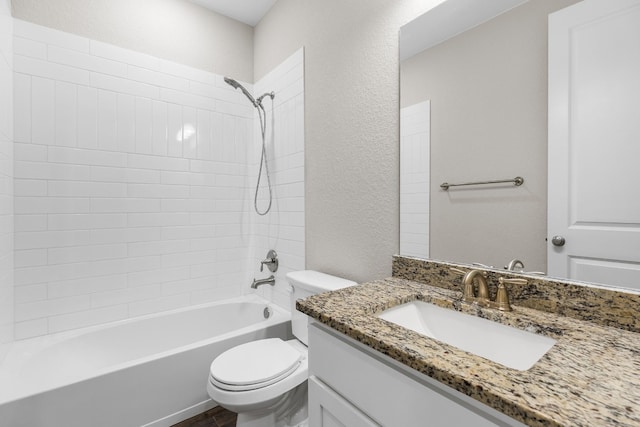 full bathroom featuring shower / tub combination, vanity, and toilet