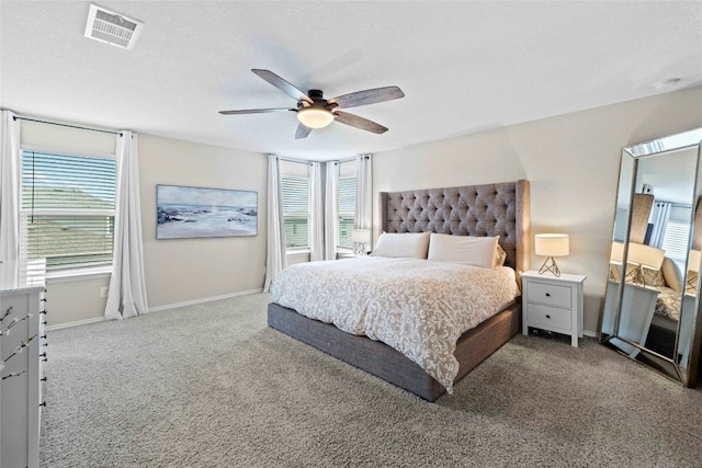 bedroom featuring ceiling fan and light colored carpet