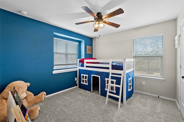 bedroom featuring carpet flooring and ceiling fan