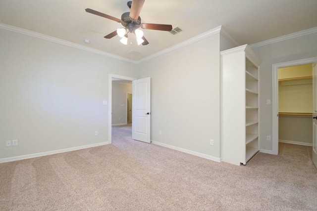 604 Hannahs Run, New Braunfels, TX 78130 - unfurnished bedroom with carpet, ornamental molding, a walk in closet, ceiling fan, and a closet