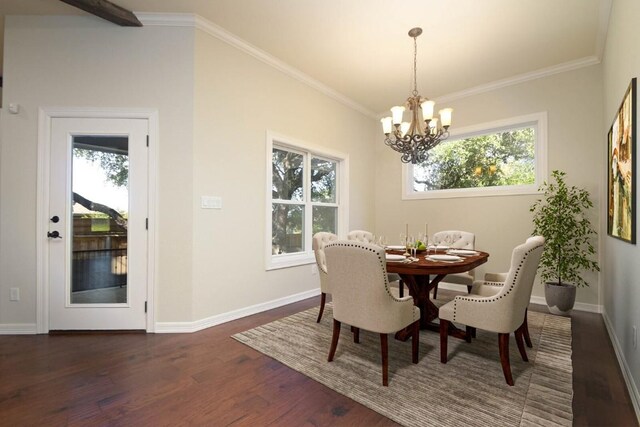 604 Hannahs Run, New Braunfels, TX 78130 - dining area featuring dark wood-type flooring, a chandelier, and crown molding