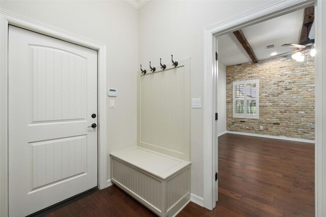 604 Hannahs Run, New Braunfels, TX 78130 - mudroom with dark wood-style flooring, brick wall, ceiling fan, and beam ceiling