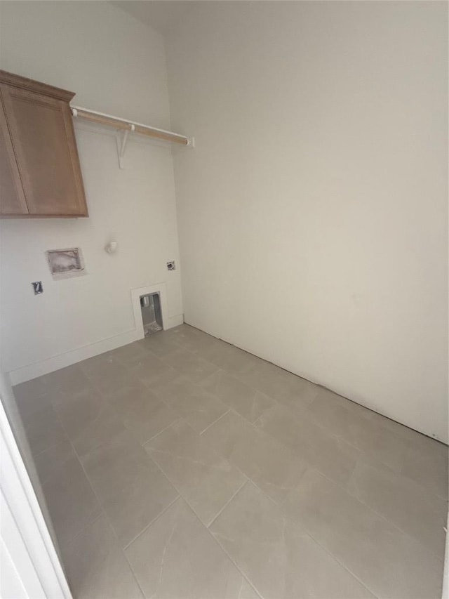 1748 Snowdrop Dr, Georgetown, TX 78628 - laundry room with washer hookup, hookup for an electric dryer, hookup for a gas dryer, and cabinet space