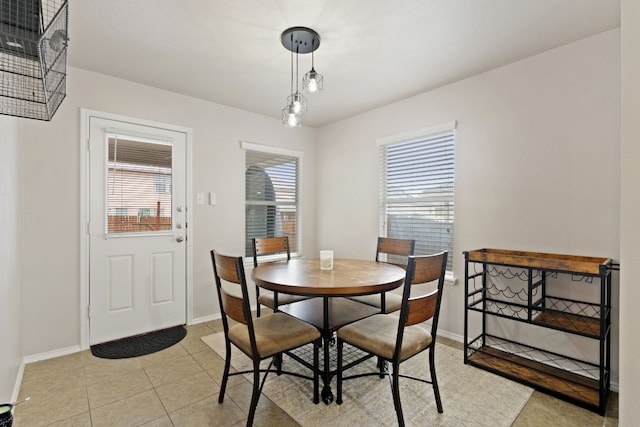 tiled dining area with plenty of natural light