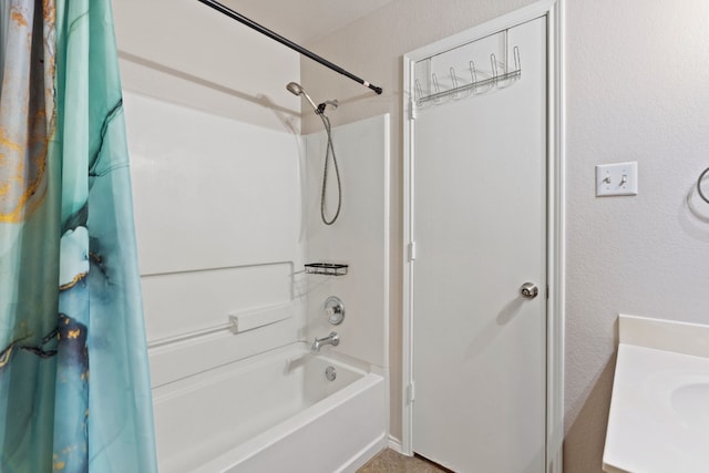 bathroom with vanity and shower / bath combo