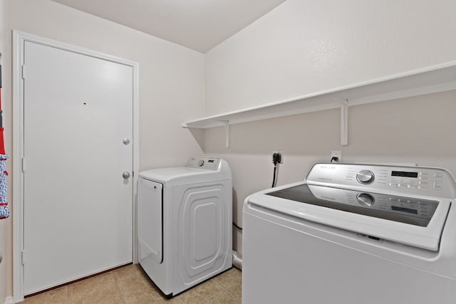 laundry area with washer and dryer