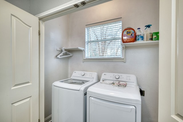 laundry area with washer and clothes dryer