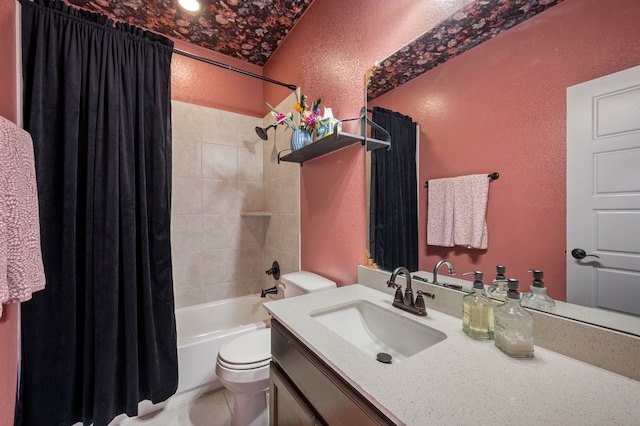 full bathroom with vanity, shower / tub combo, and toilet