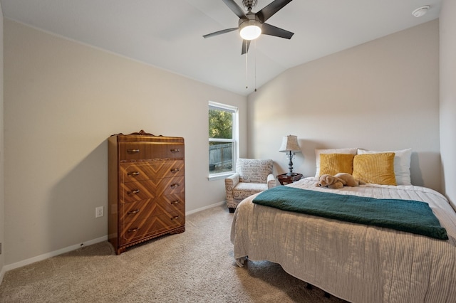 carpeted bedroom featuring ceiling fan and lofted ceiling