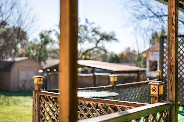 deck featuring a shed