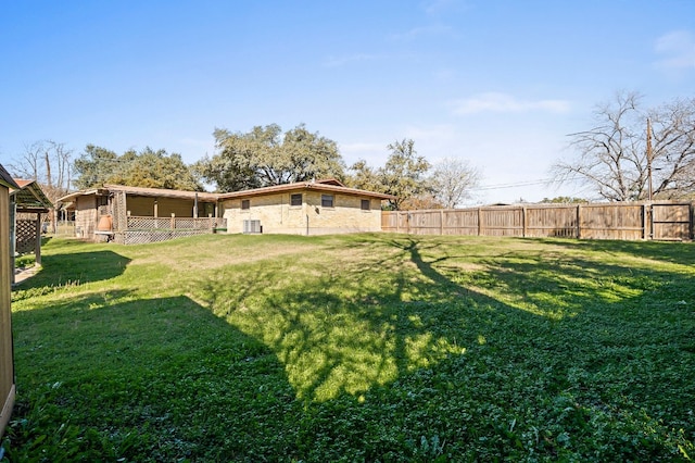 view of yard featuring central AC