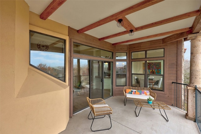 sunroom / solarium with beam ceiling