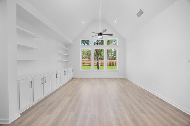 6000 Sean Paul Ln, Georgetown, TX 78628 - unfurnished living room featuring a ceiling fan, light wood-type flooring, high vaulted ceiling, and recessed lighting