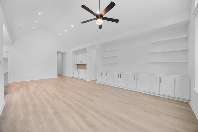 6000 Sean Paul Ln, Georgetown, TX 78628 - unfurnished living room featuring ceiling fan, recessed lighting, light wood finished floors, and high vaulted ceiling