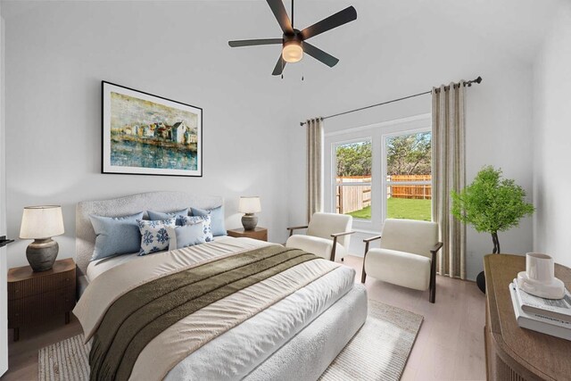 6000 Sean Paul Ln, Georgetown, TX 78628 - bedroom with vaulted ceiling, wood finished floors, and a ceiling fan