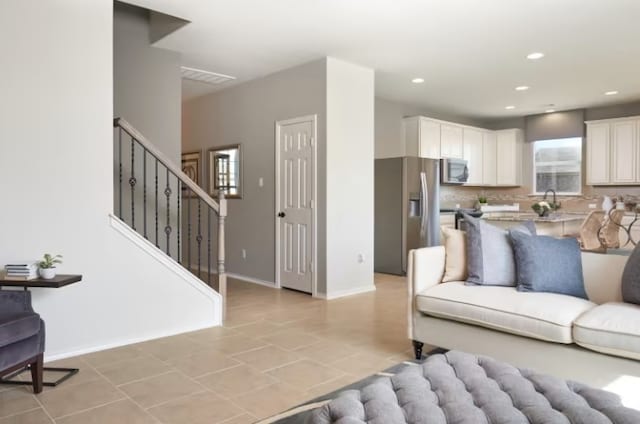 living room featuring light tile patterned floors