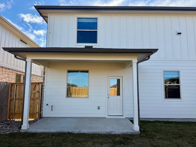 rear view of property with a patio area