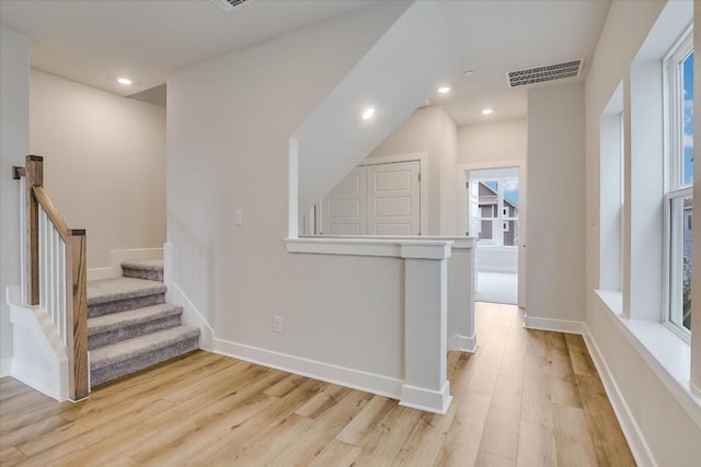 832 Venus Cir, Round Rock, TX 78664 - staircase with wood finished floors and recessed lighting
