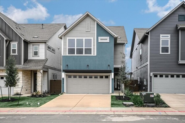 832 Venus Cir, Round Rock, TX 78664 - view of front of house featuring an attached garage, driveway, and stucco siding