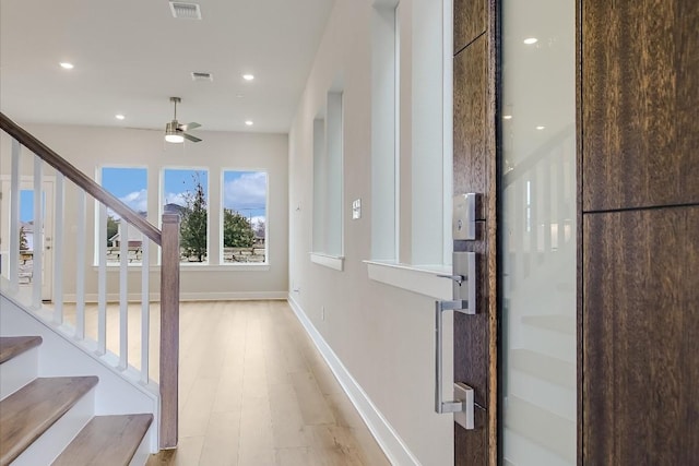 832 Venus Cir, Round Rock, TX 78664 - stairway with ceiling fan and recessed lighting