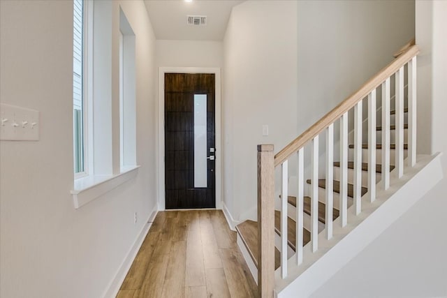 832 Venus Cir, Round Rock, TX 78664 - entrance foyer featuring wood finished floors and stairway