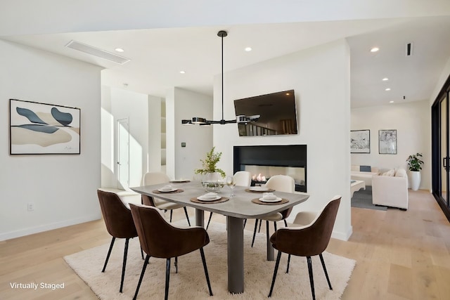 dining area with light wood-type flooring