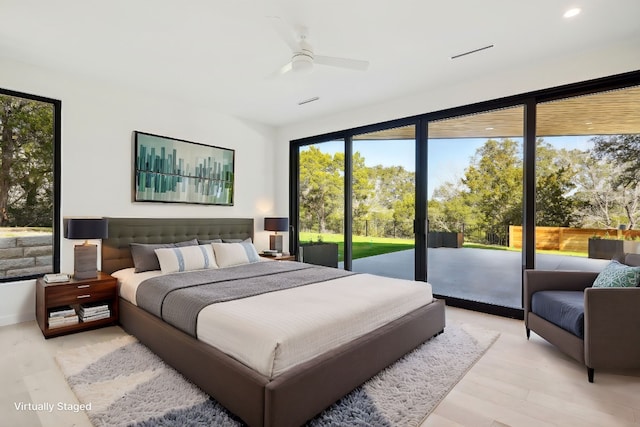 bedroom with access to outside, ceiling fan, and light wood-type flooring