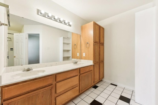 bathroom featuring tile patterned floors and vanity