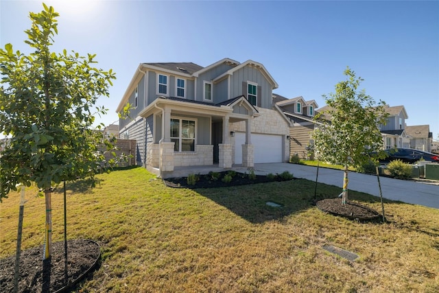 craftsman-style house with a garage and a front yard