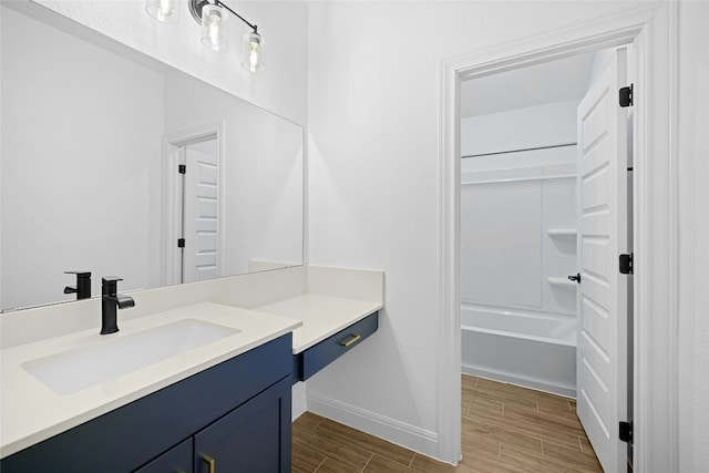 bathroom featuring vanity and shower / bathtub combination