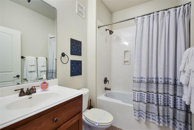 full bathroom featuring vanity, toilet, and shower / bath combo with shower curtain