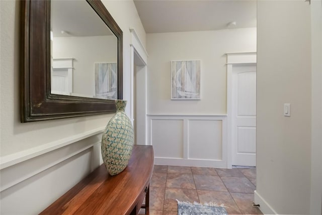 corridor with light tile patterned floors