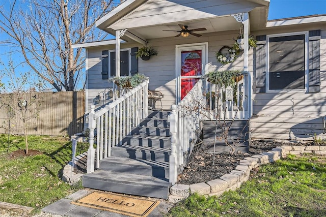 doorway to property with ceiling fan