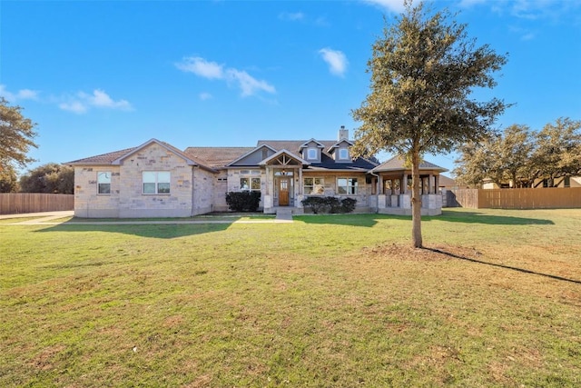 view of front of house featuring a front lawn